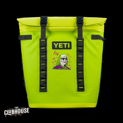 Front view of the SWAG Golf x YETI Hopper M20 backpack soft cooler with the Defaced Franklin graphic, clasp closure, and YETI branding.