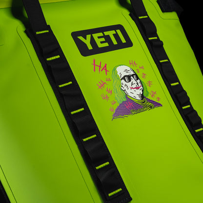 Close-up of the SWAG Golf x YETI Hopper M20 backpack soft cooler featuring the exclusive Defaced Franklin graphic on the front panel.