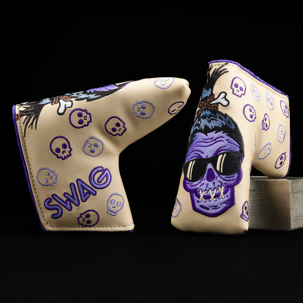 Voodoo Shrunken purple skull with beige blade putter golf club head cover made in the USA.