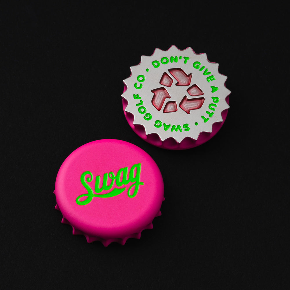 Pink swag bottle cap ball marker golf accessory.