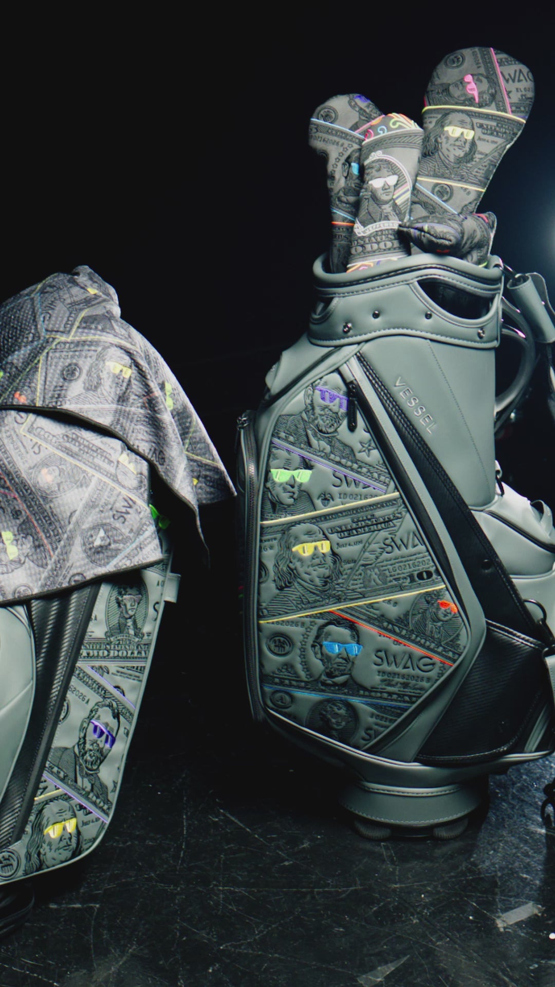 Load video: SWAG Golf Presidents Day collection featuring limited edition golf headcovers, putters, apparel, and accessories with a currency theme.