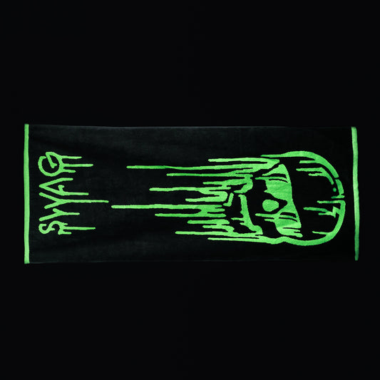 Swag dripping skull black golf towel with green accents.