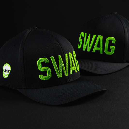 Swag x G/Fore black men's golf snapback hat with green letters and an embroidered skull on the right side.