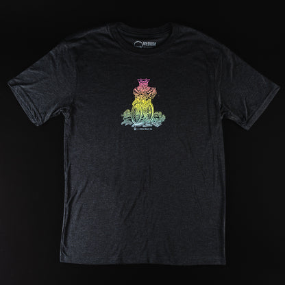 Swag Golf black t-shirt with rainbow colored graphic of a king riding a bicycle.