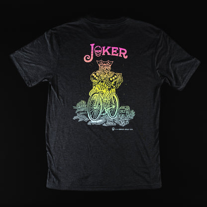 Swag Golf black t-shirt with rainbow colored graphic of a king riding a bicycle.