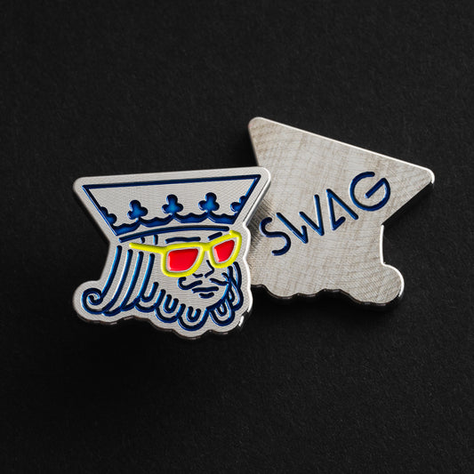 King of Swag cnc milled stainless steel golf ball marker with blue, red and yellow painted accents made in the USA.