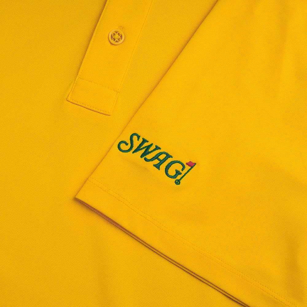 Swag x G/FORE yellow men's slim fit short sleeve golf polo shirt with Augusta Swag script logo on sleeve.