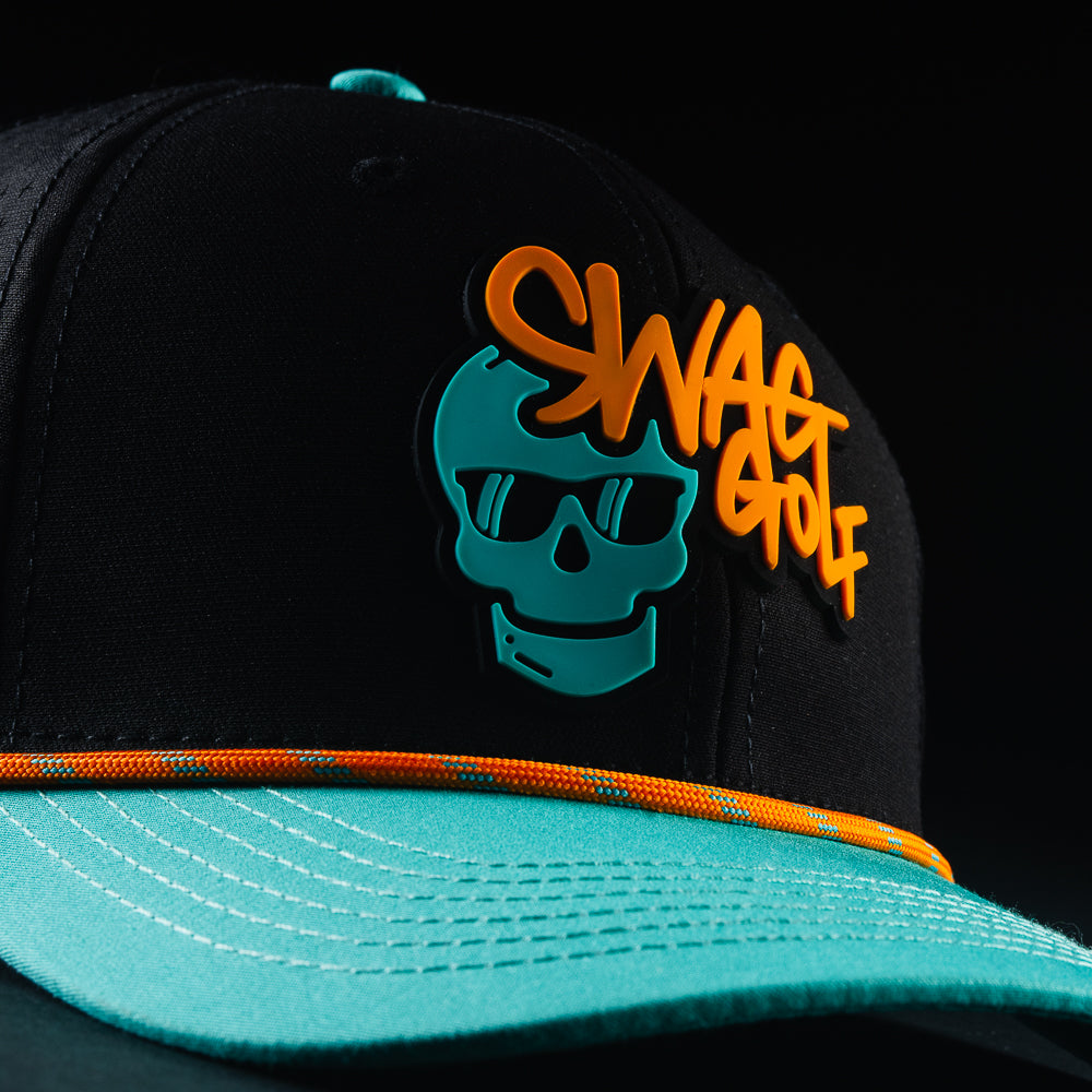 Swag x UNRL graffiti rope black, teal and orange snapback hat.