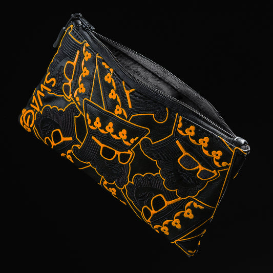 Swagmas stacked king black valuables pouch with neon orange accents.