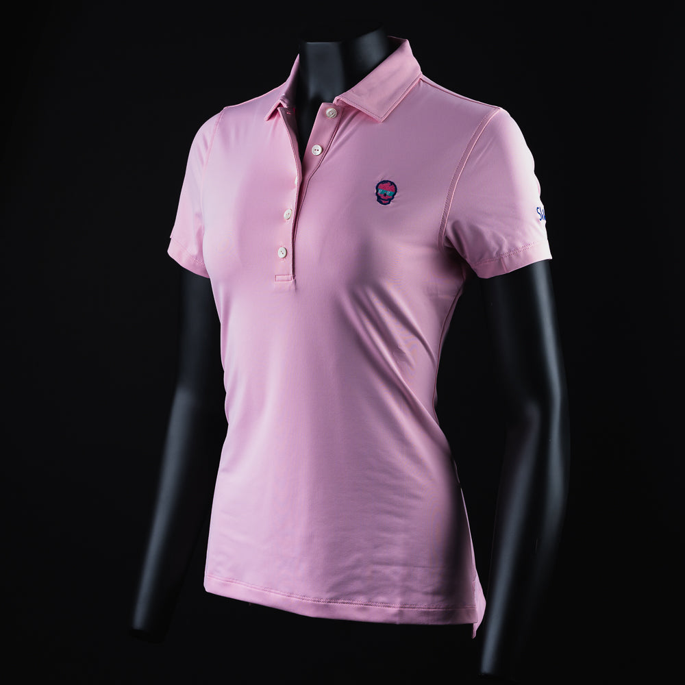Women's Peter Millar pink short sleeve polo shirt with skull logo.